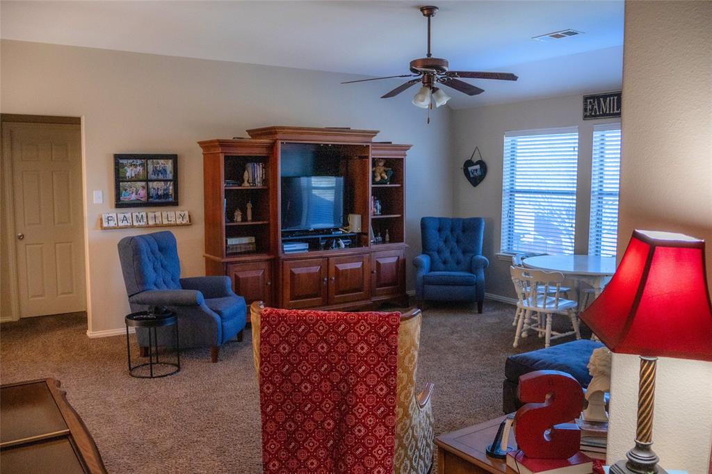 1395 Southern Rockwall, TX 75087 - Photo 14 of 22 a living room with furniture and a flat screen tv