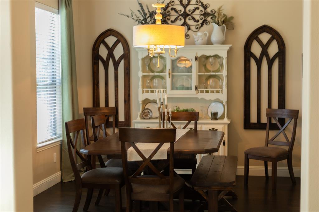 1395 Southern Rockwall, TX 75087 - Photo 2 of 22 a view of a dining room with furniture and a window