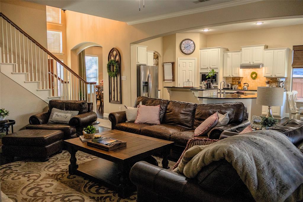 1395 Southern Rockwall, TX 75087 - Photo 3 of 22 a living room with furniture and a large window