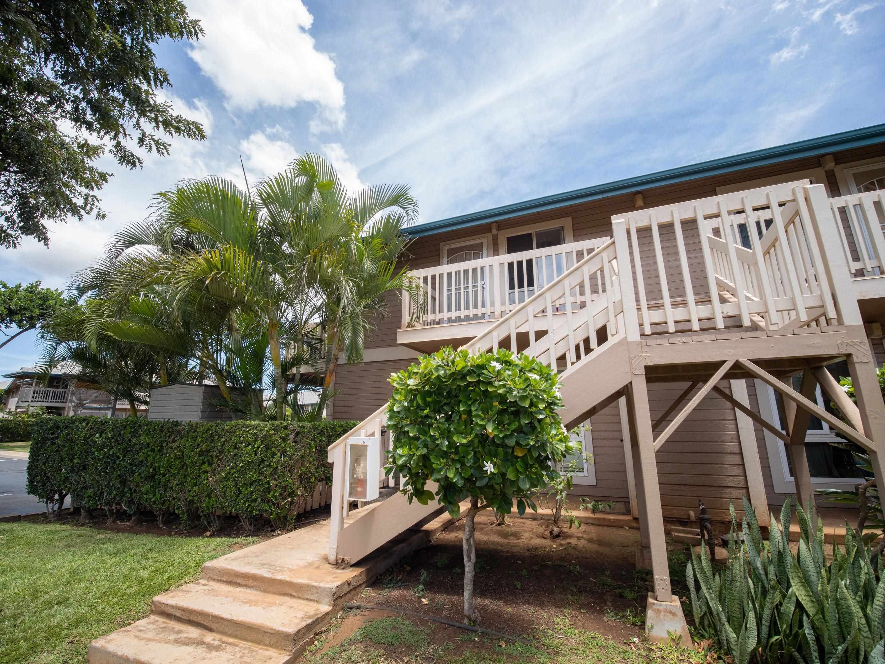 480 Kenolio Road, Unit 30206 Kihei, HI 96753 - Photo 14 of 20 a view of a house with a yard