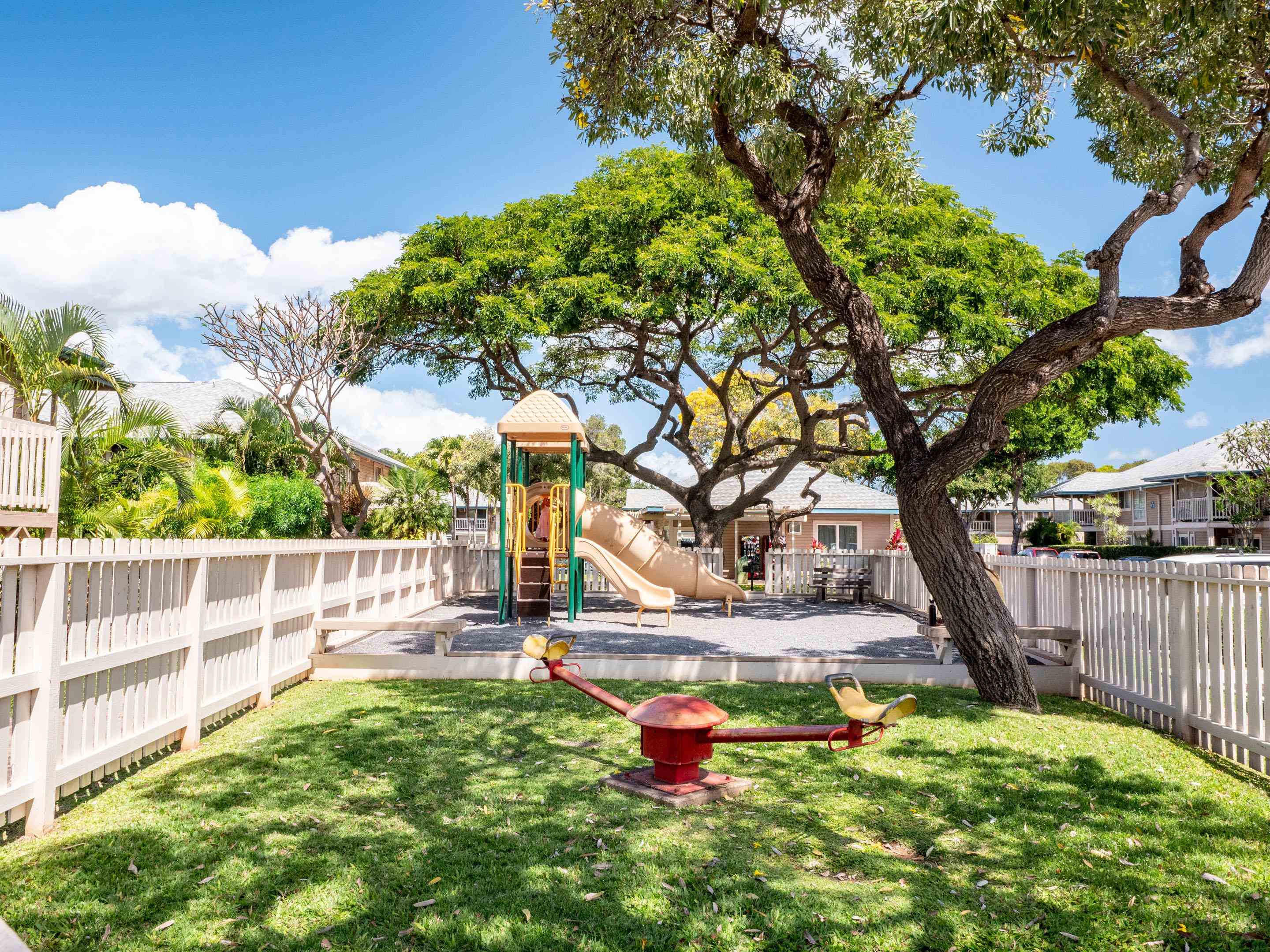 480 Kenolio Road, Unit 30206 Kihei, HI 96753 - Photo 15 of 20 a backyard of a house with table and chairs