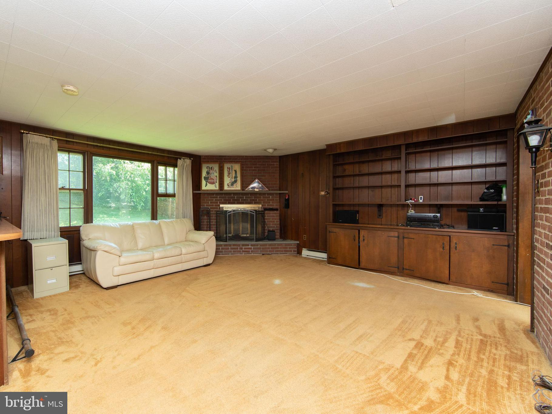 2945 Banner Road Willow Grove, PA 19090 - Photo 12 of 44 Large family room with wood-burning fireplace
