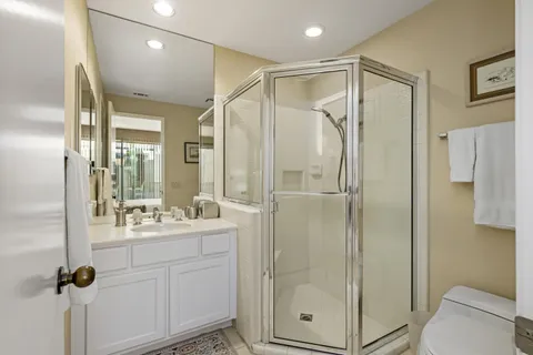 a bedroom with bed and a window