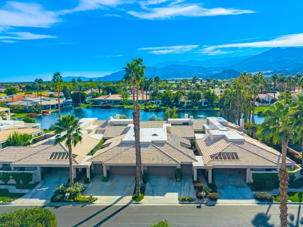 a view of multiple houses with a city street
