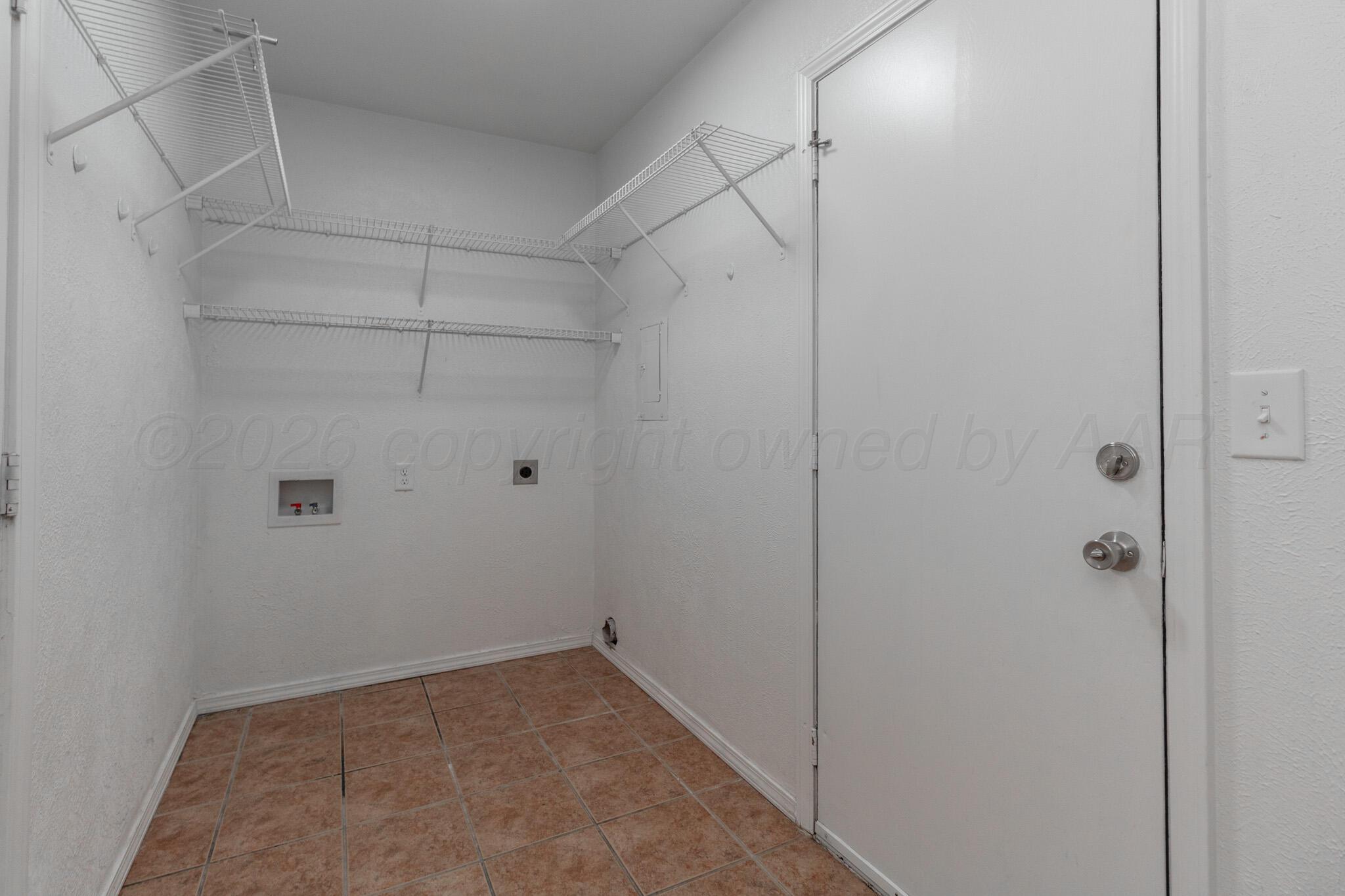 4216 Southwest 38th Avenue Amarillo, TX 79109 - Photo 19 of 19 a view of a room with racks on the wall