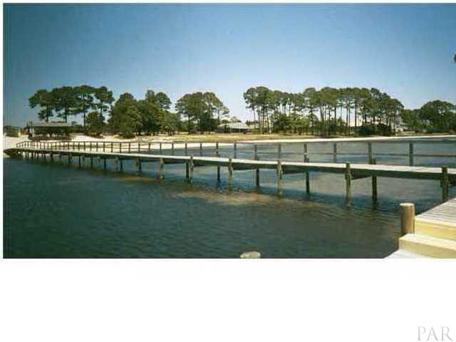 69-152 Cove Road Navarre, FL 32566 - Photo 5 of 11 The Dock and Beach at The Holley BY The Sea Rec Center.