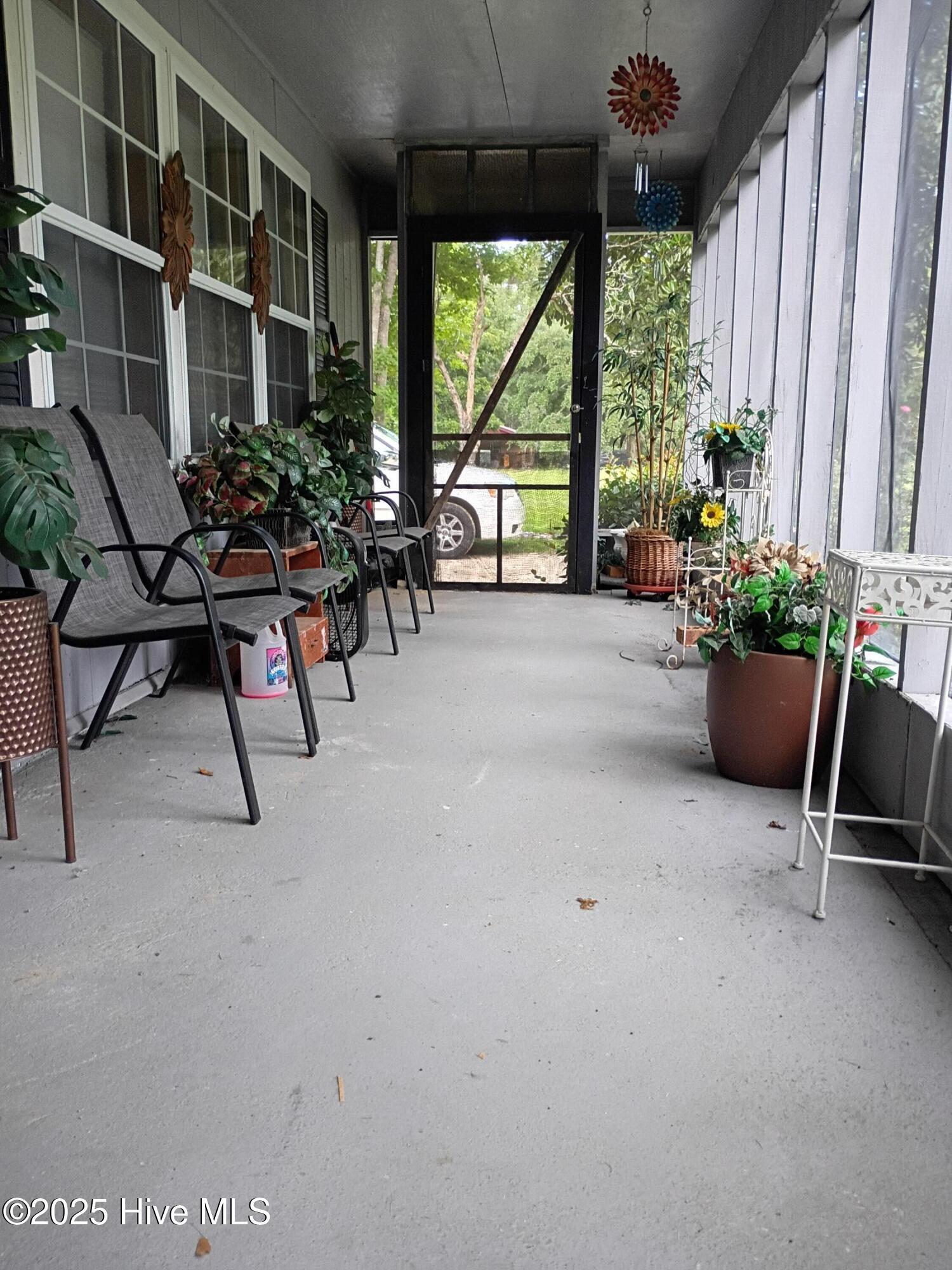 157 East Goodman Road Fair Bluff, NC 28439 - Photo 2 of 19 Screened front porch