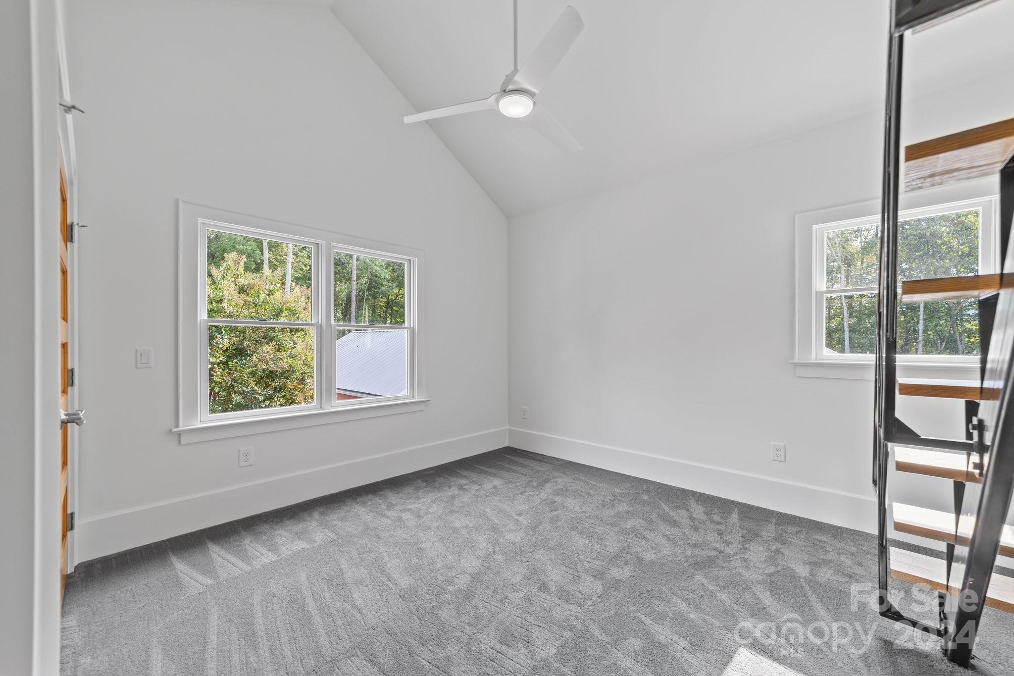 2615 Grey Road Davidson, NC 28036 - Photo 28 of 48 an empty room with windows