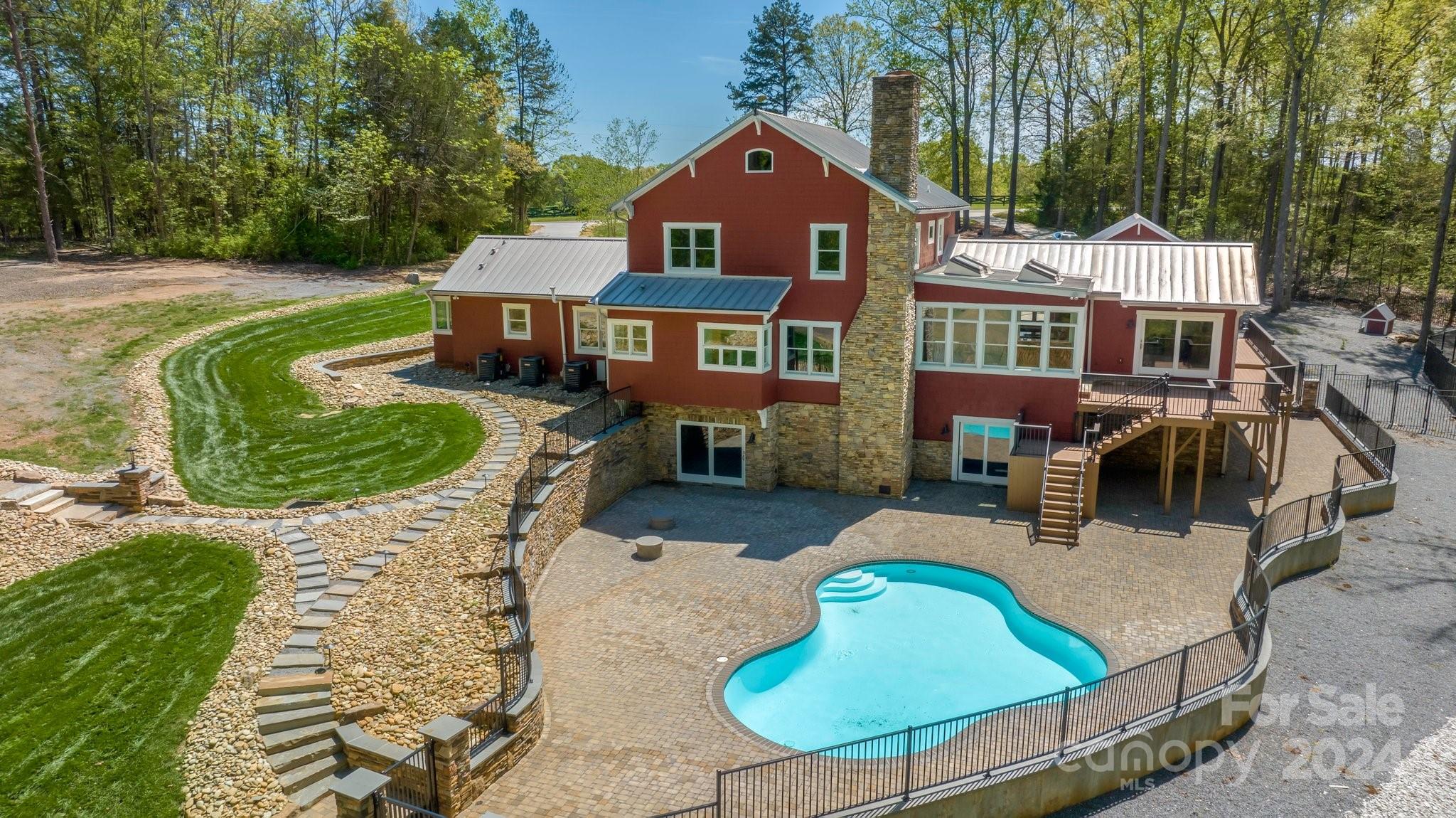 2615 Grey Road Davidson, NC 28036 - Photo 44 of 48 an aerial view of a house with swimming pool and patio