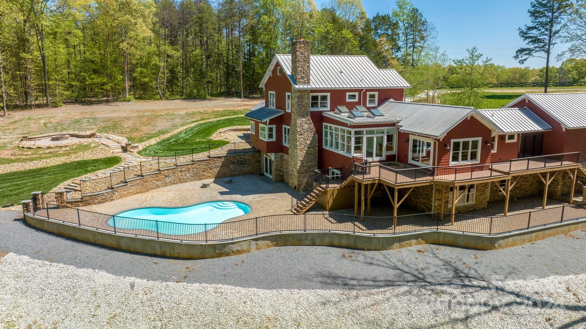 2615 Grey Road Davidson, NC 28036 - Photo 45 of 48 a view of a house with a yard and sitting area