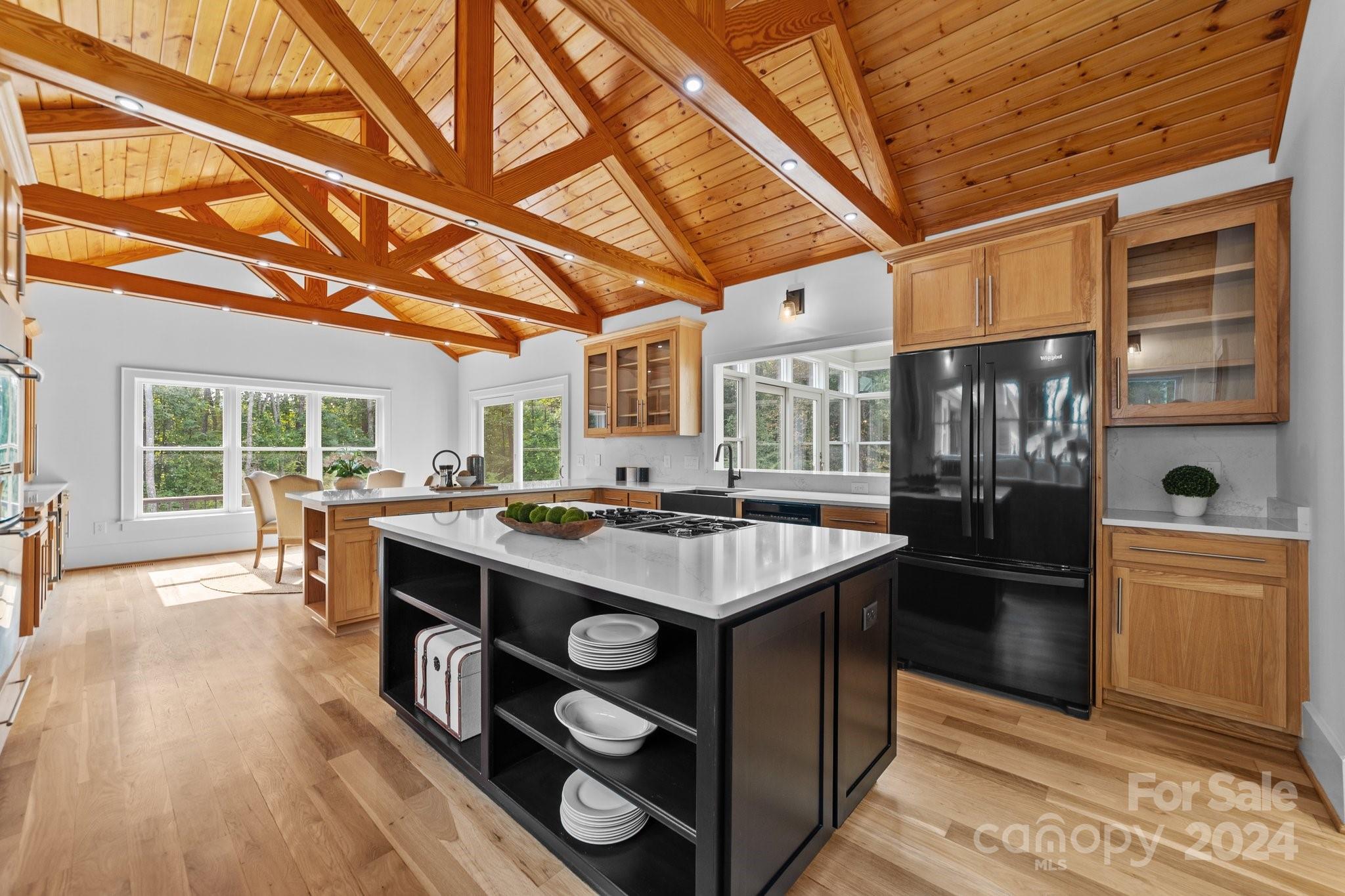 2615 Grey Road Davidson, NC 28036 - Photo 10 of 48 a kitchen with a stove and a refrigerator
