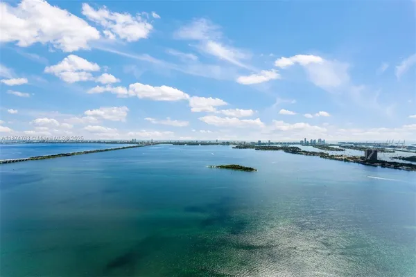 a view of a lake from a yard