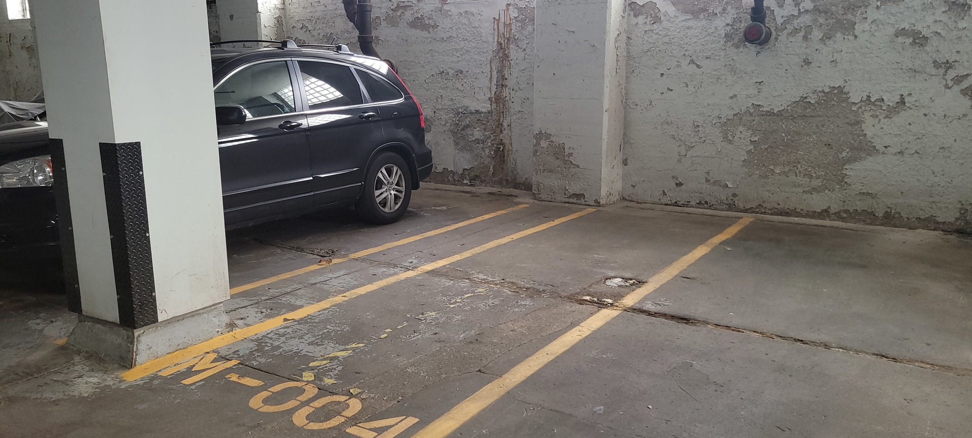 1040 West Adams Street, Unit PM004 Chicago, IL 60607 - Photo 2 of 2 a car parked in a parking space