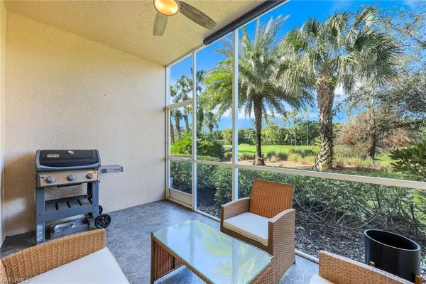 a view of a sitting area with furniture and a yard