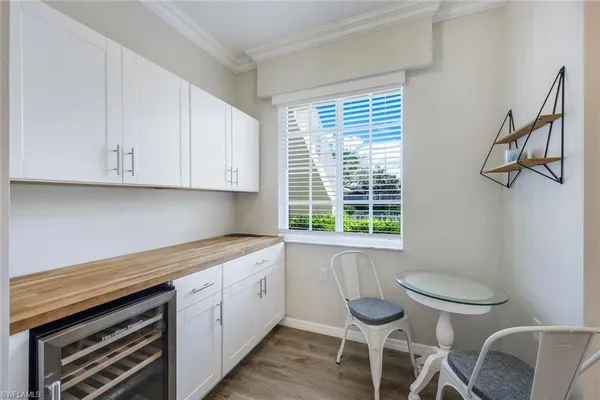 a kitchen with a cabinets and a table