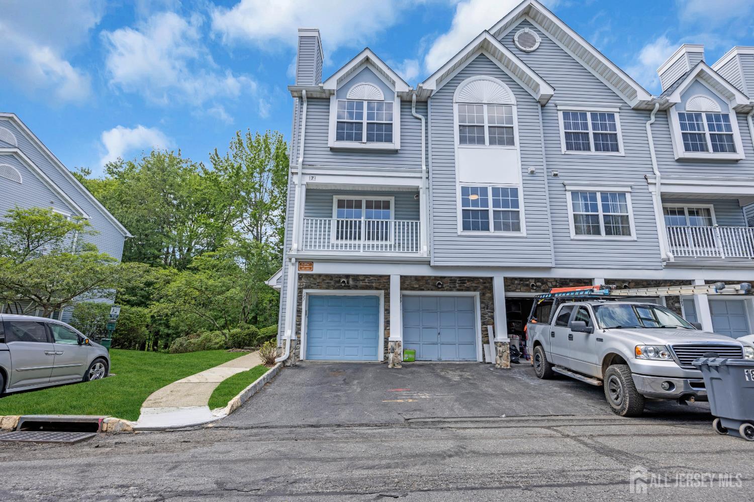 187 Prestwick Way Edison, NJ 08820 - Photo 2 of 23 a front view of a house with a garden