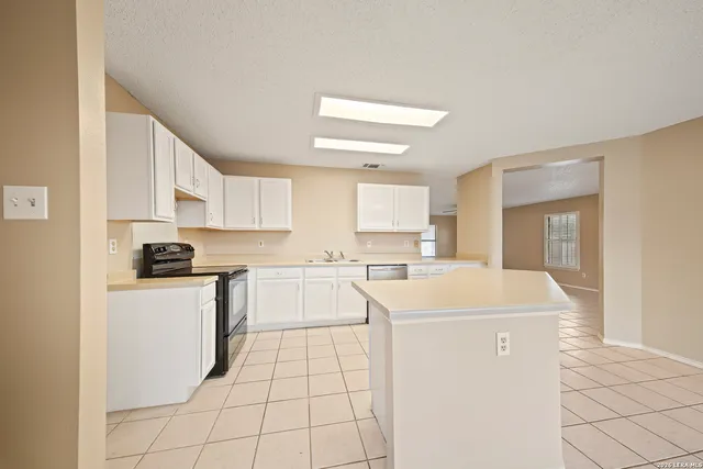 a view of an empty room with window