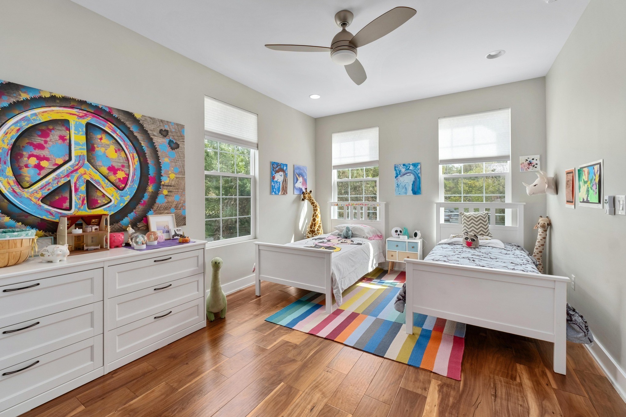 3302 Funston Street Austin, TX 78703 - Photo 21 of 36 Bedroom featuring wood finished floors and a ceiling fan