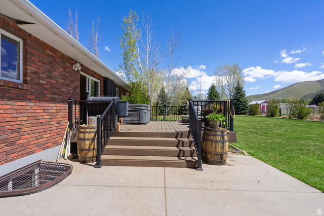 781 West 3000 South Heber City, UT 84032 - Photo 22 of 30 View of patio / terrace with a deck with mountain view
