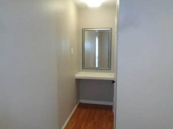 a bathroom with a sink and mirror