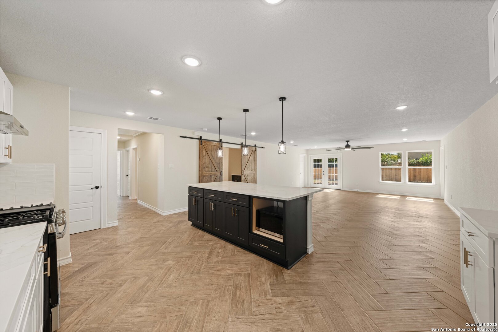 246 Sprucewood Lane San Antonio, TX 78216 - Photo 12 of 42 a view of kitchen with kitchen island sink stove and cabinets