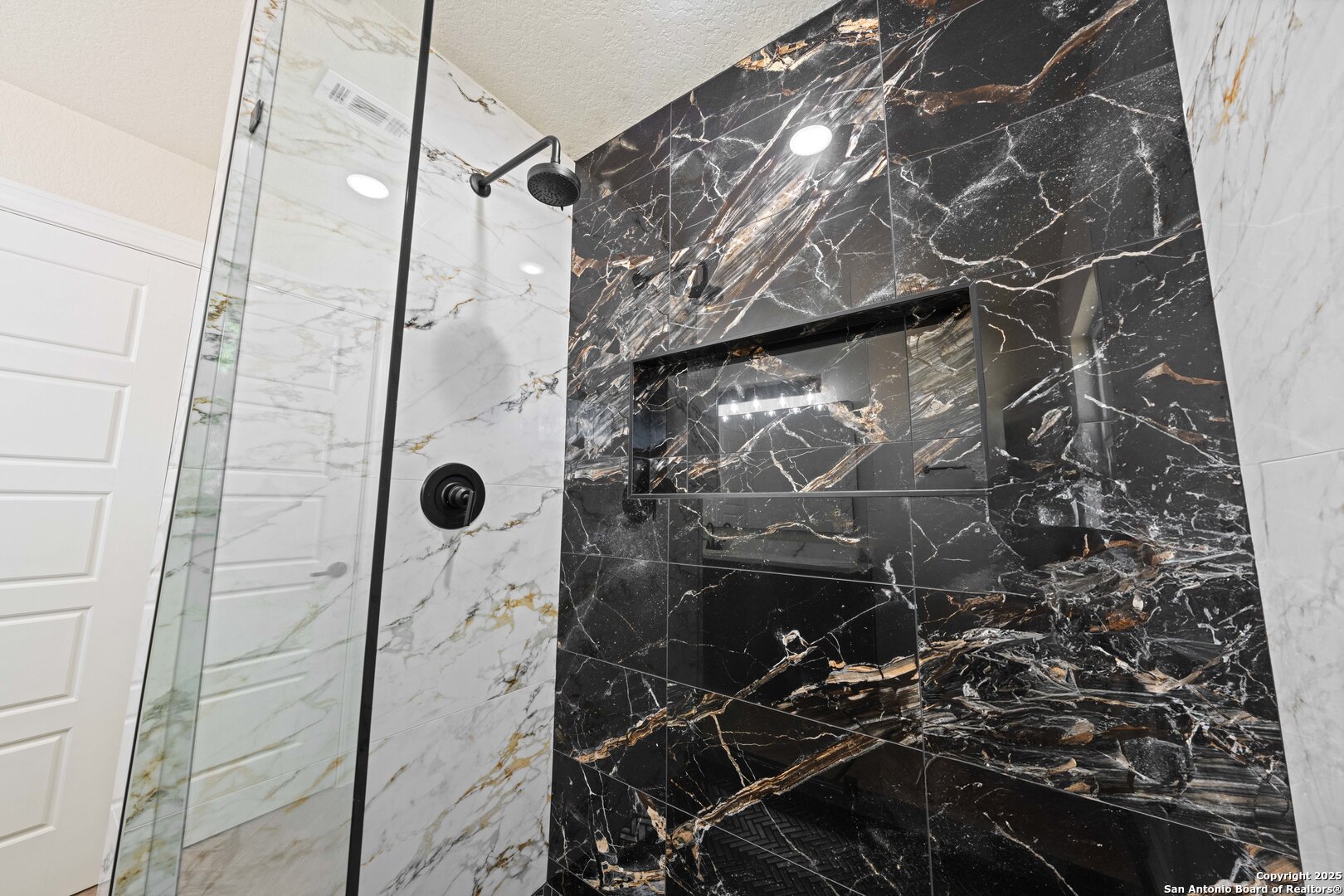 246 Sprucewood Lane San Antonio, TX 78216 - Photo 29 of 42 a bathroom with a shower