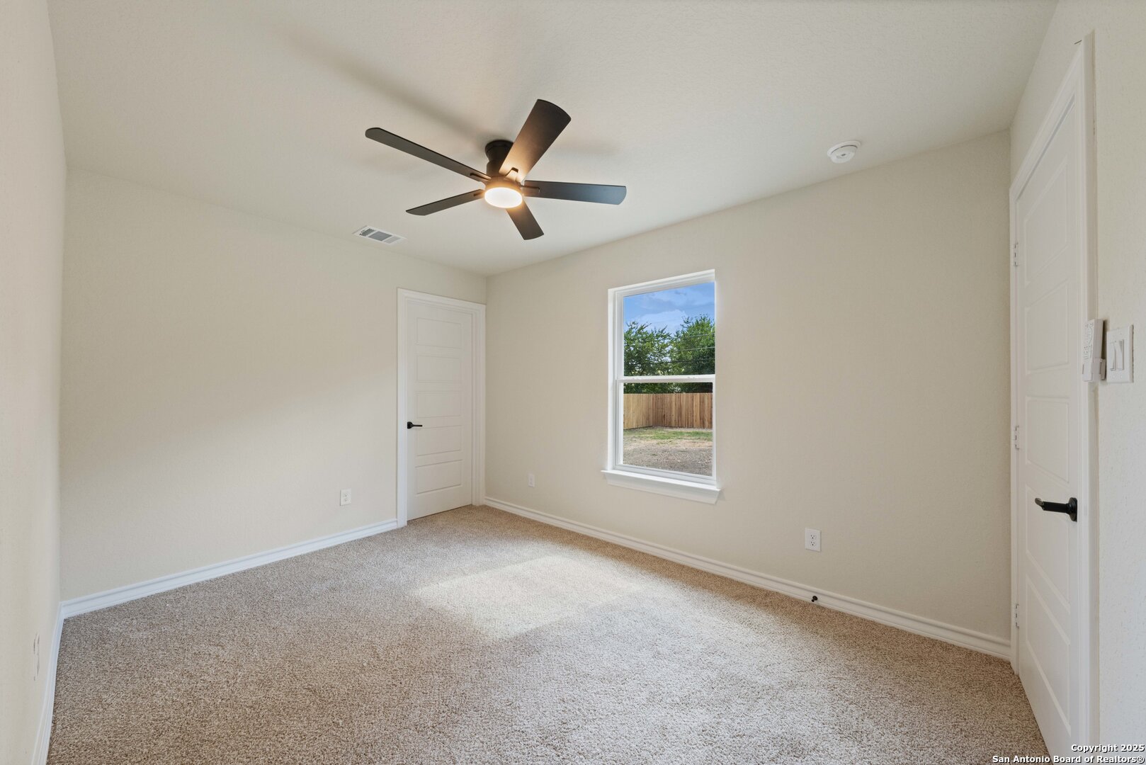 246 Sprucewood Lane San Antonio, TX 78216 - Photo 37 of 42 a view of an empty room with a window