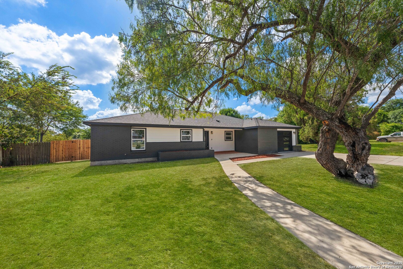 246 Sprucewood Lane San Antonio, TX 78216 - Photo 9 of 42 a front view of a house with garden