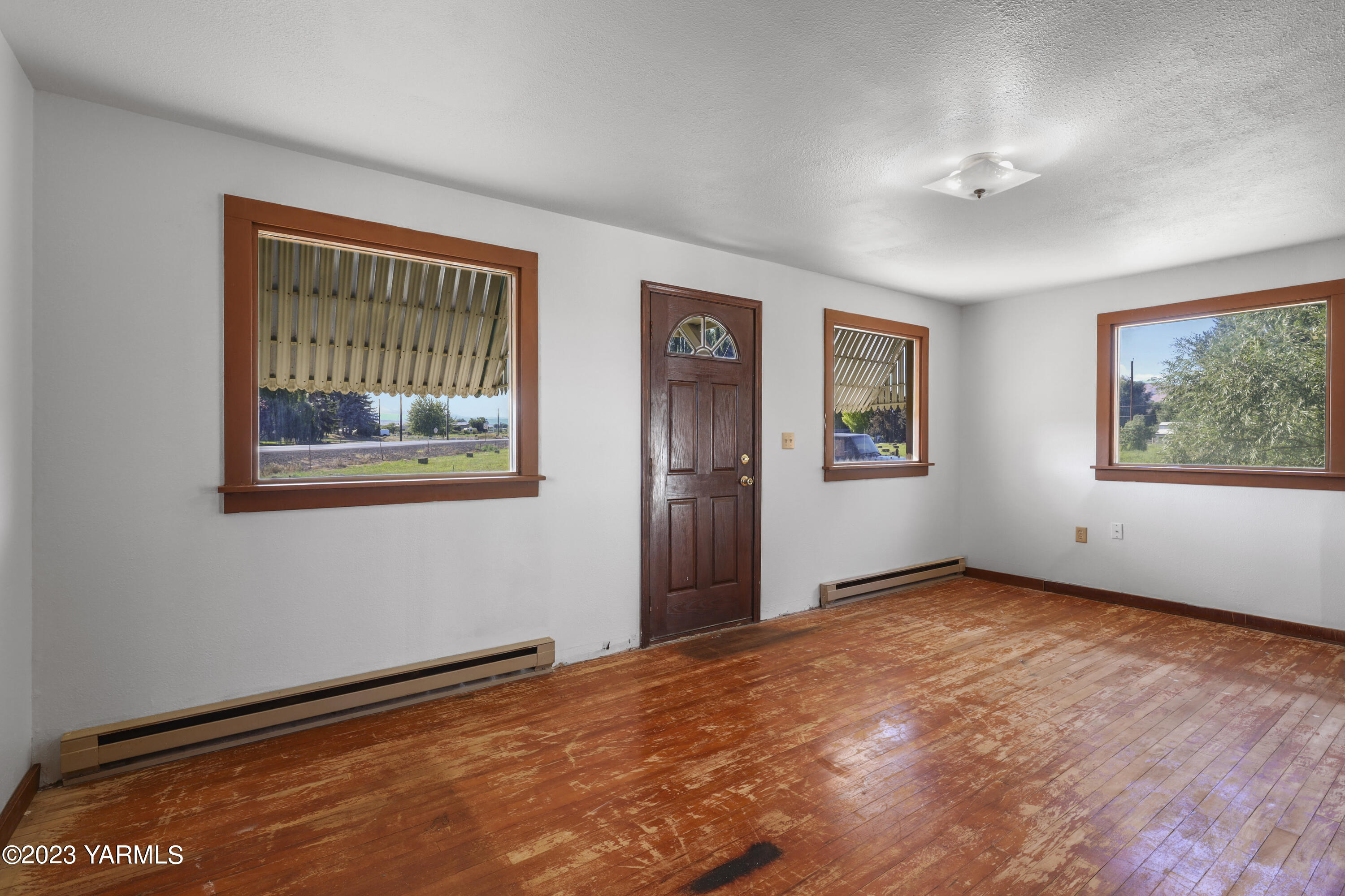 17271 Summitview Road Cowiche, WA 98923 - Photo 5 of 20 a view of an empty room with a window
