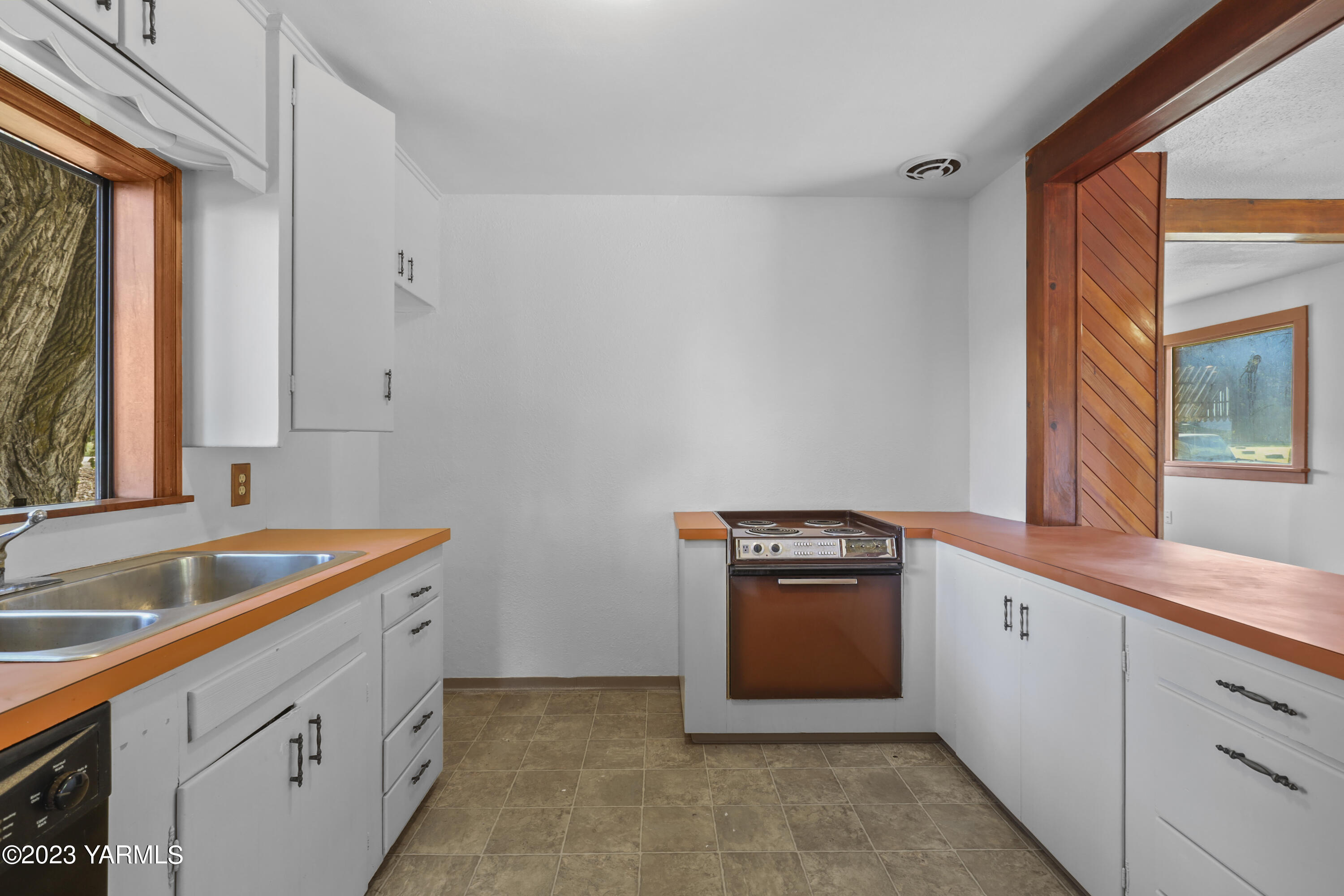 17271 Summitview Road Cowiche, WA 98923 - Photo 7 of 20 a kitchen with a sink and cabinets