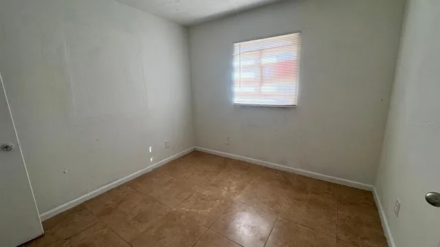 an empty room with a window