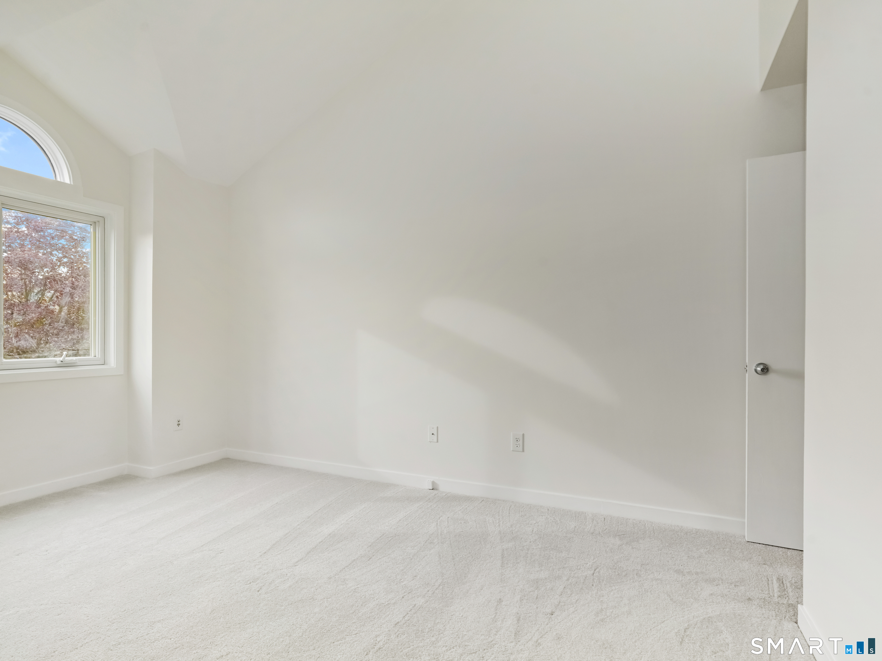 15 Perry Avenue, Unit D10 Norwalk, CT 06850 - Photo 15 of 23 an empty room with a window