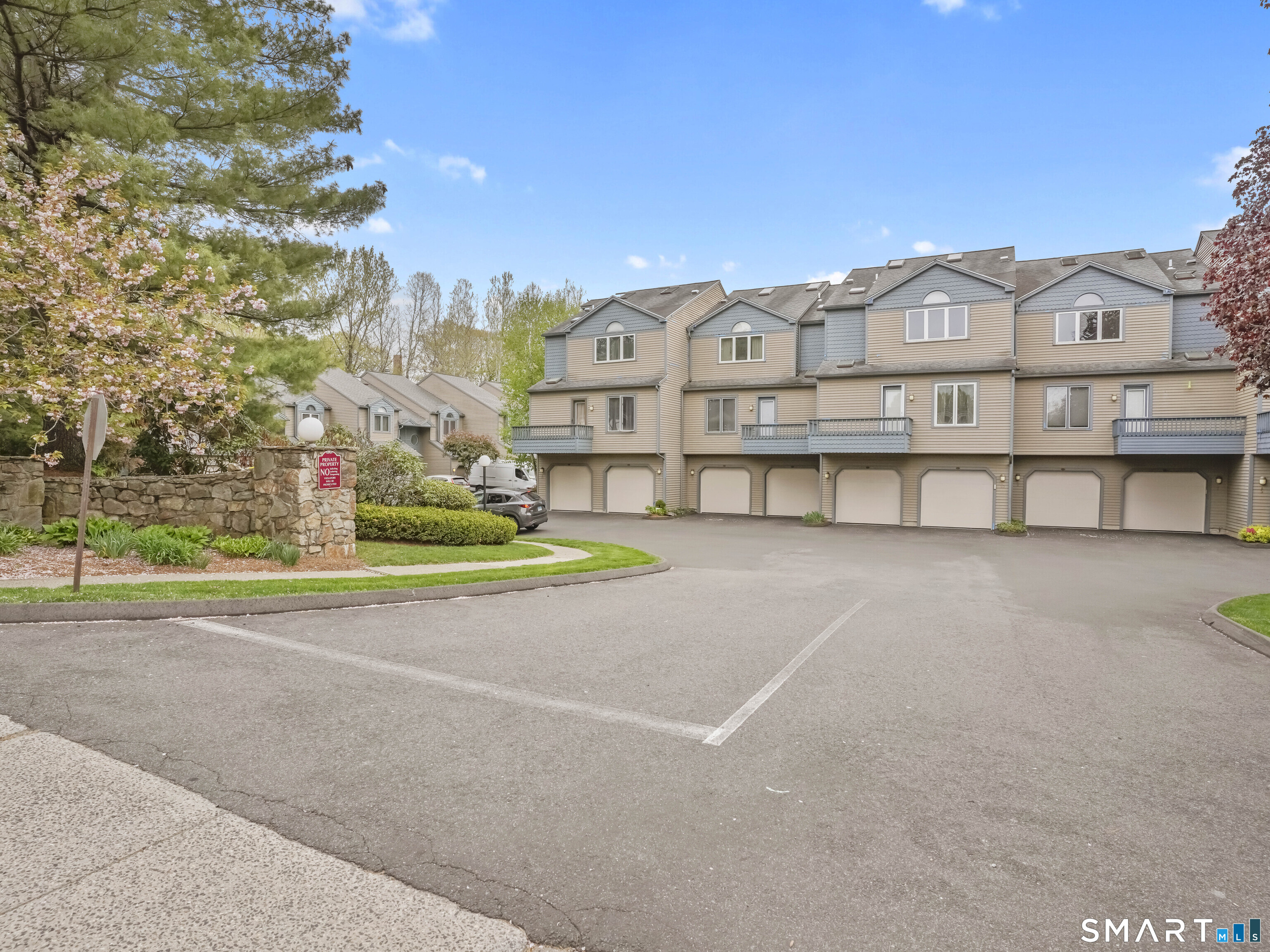 15 Perry Avenue, Unit D10 Norwalk, CT 06850 - Photo 2 of 23 a view of a house with a yard and pathway