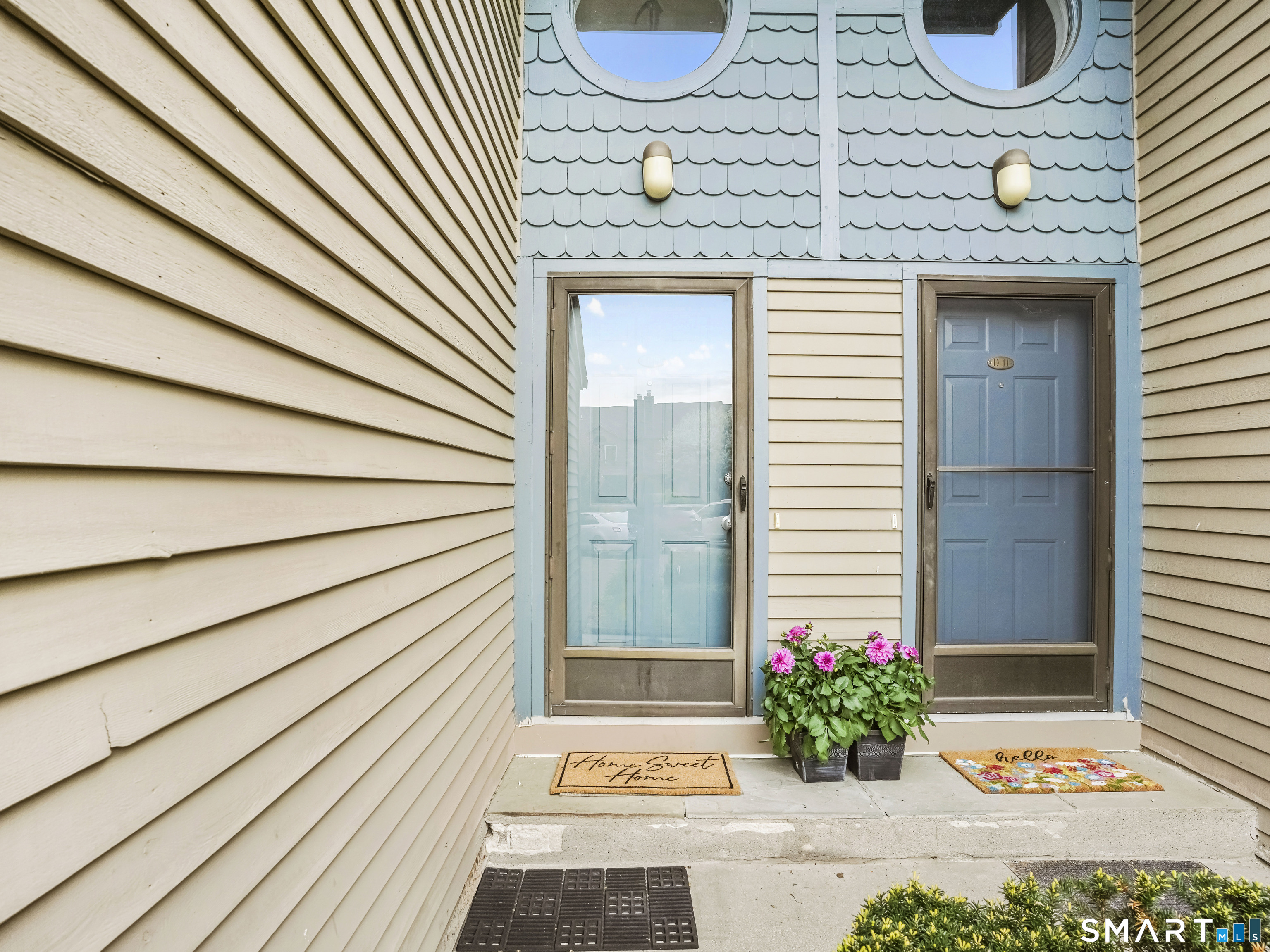 15 Perry Avenue, Unit D10 Norwalk, CT 06850 - Photo 3 of 23 a view of a entryway door front of house