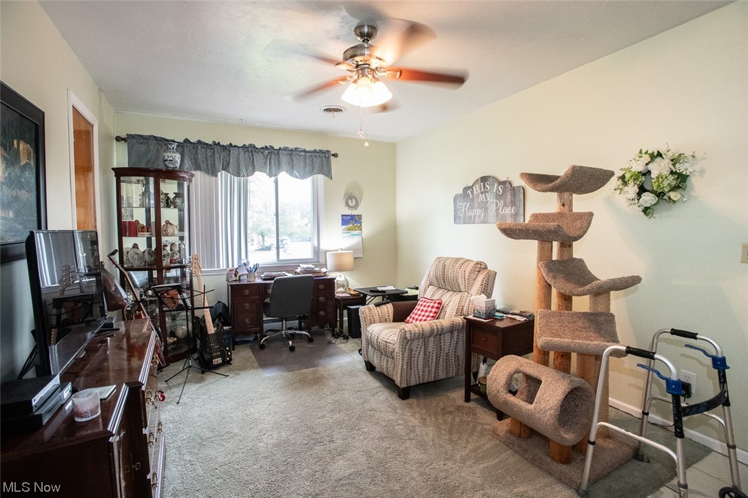 20873 Drake Road Strongsville, OH 44149 - Photo 18 of 25 Office area with light carpet and ceiling fan