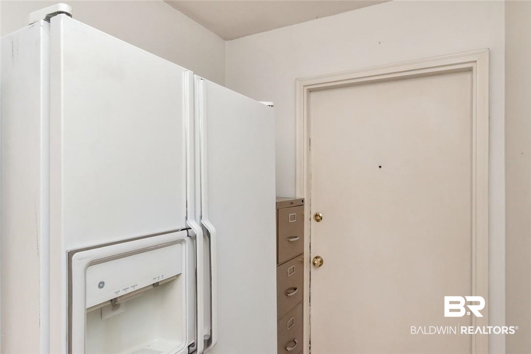 6601 Conde Court Mobile, AL 36695 - Photo 26 of 30 Interior space featuring white refrigerator with ice dispenser