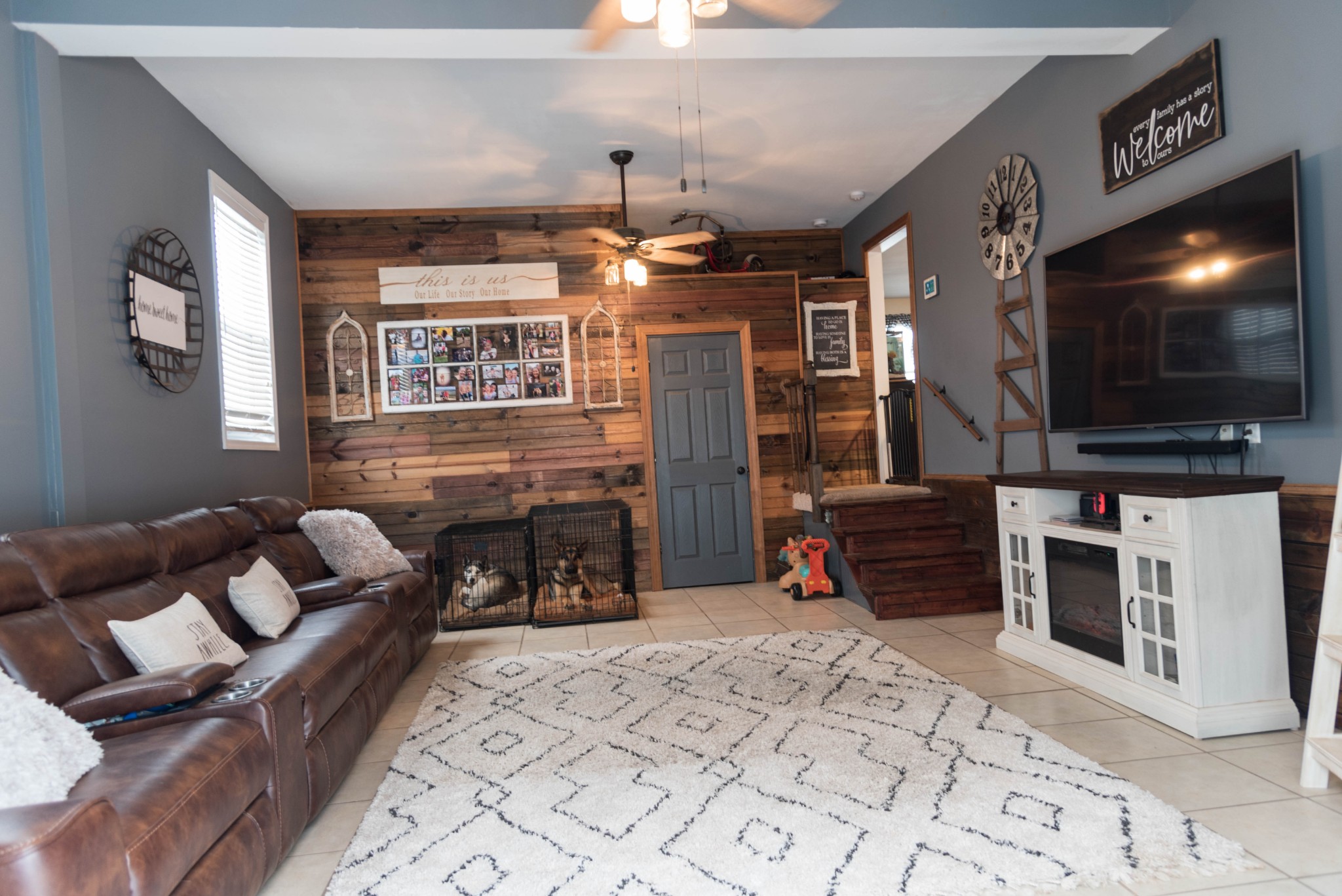105 Biggs Road Cottontown, TN 37048 - Photo 17 of 40 a living room with furniture a flat screen tv and a fireplace