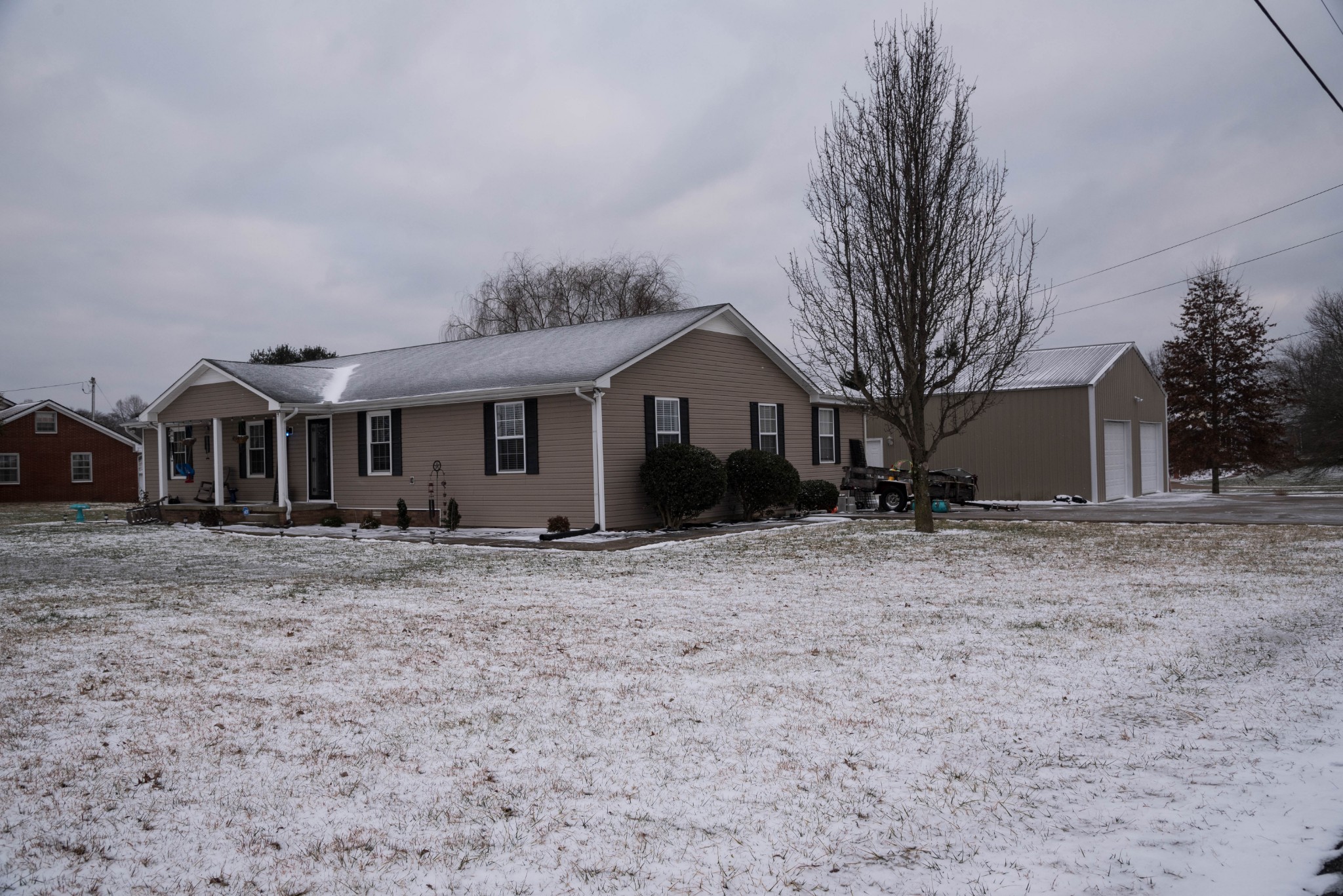 105 Biggs Road Cottontown, TN 37048 - Photo 2 of 40 a front view of a house with a yard