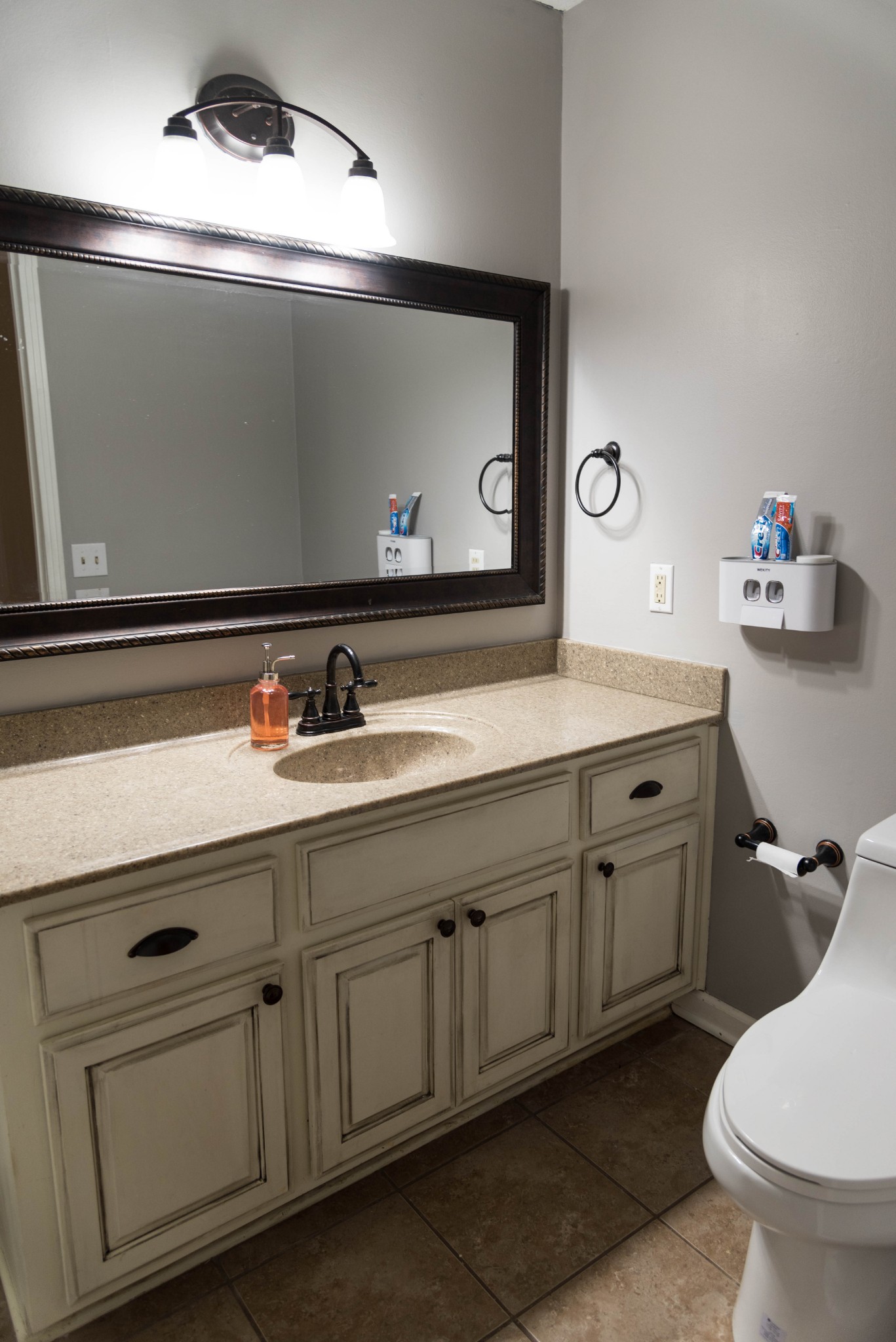 105 Biggs Road Cottontown, TN 37048 - Photo 21 of 40 a bathroom with a toilet sink and mirror