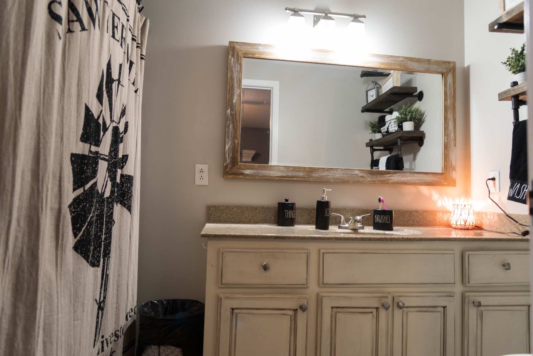 105 Biggs Road Cottontown, TN 37048 - Photo 33 of 40 a bathroom with a sink and a mirror