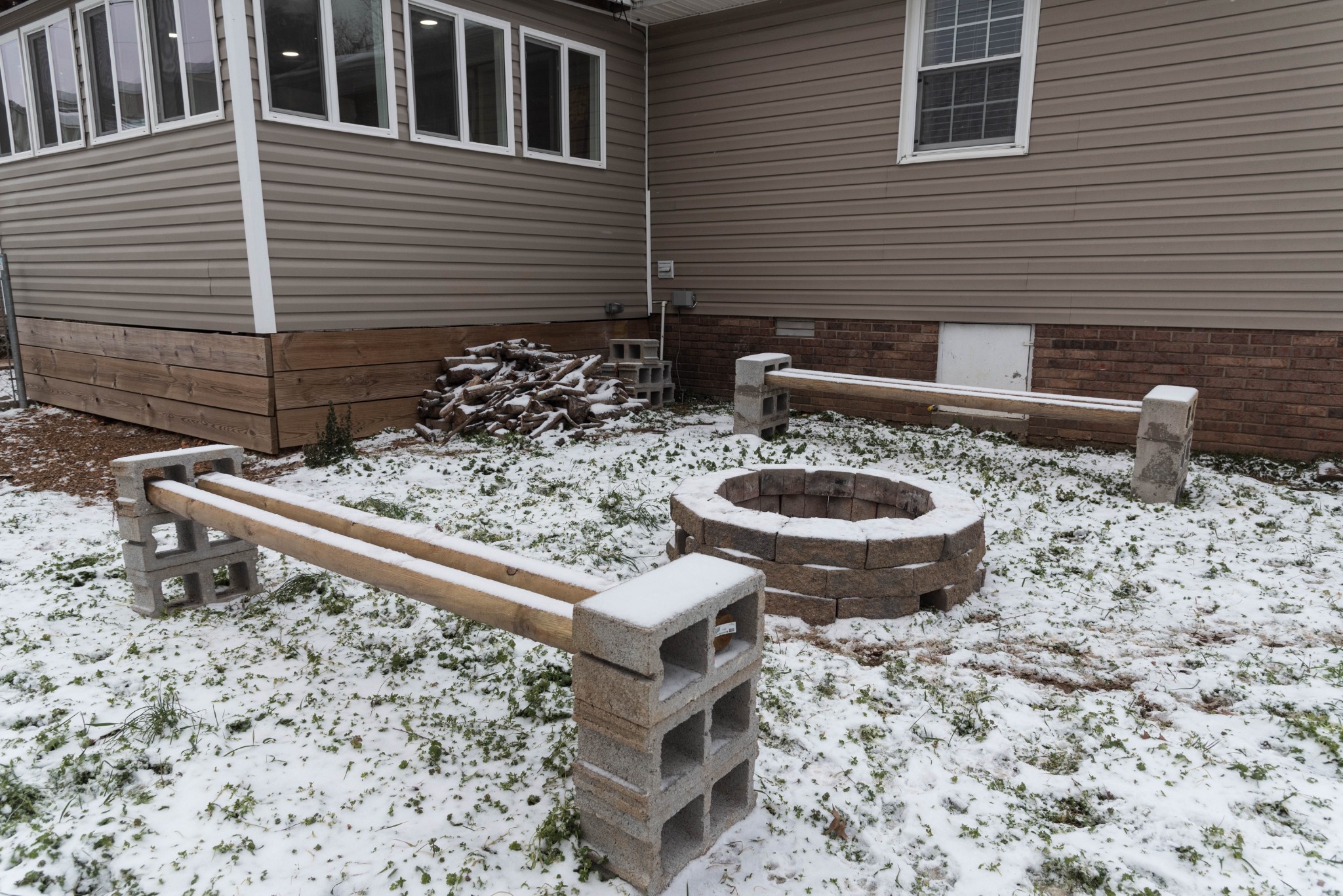 105 Biggs Road Cottontown, TN 37048 - Photo 34 of 40 a view of a backyard with table and chairs and wooden floor