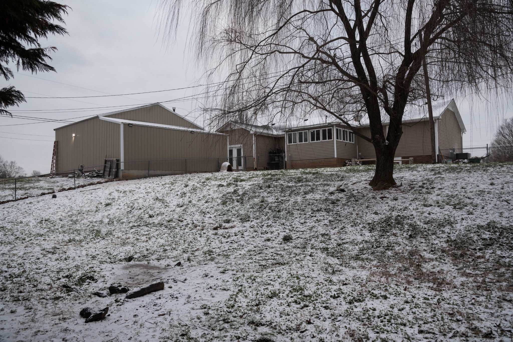 105 Biggs Road Cottontown, TN 37048 - Photo 36 of 40 a front view of a house with a yard