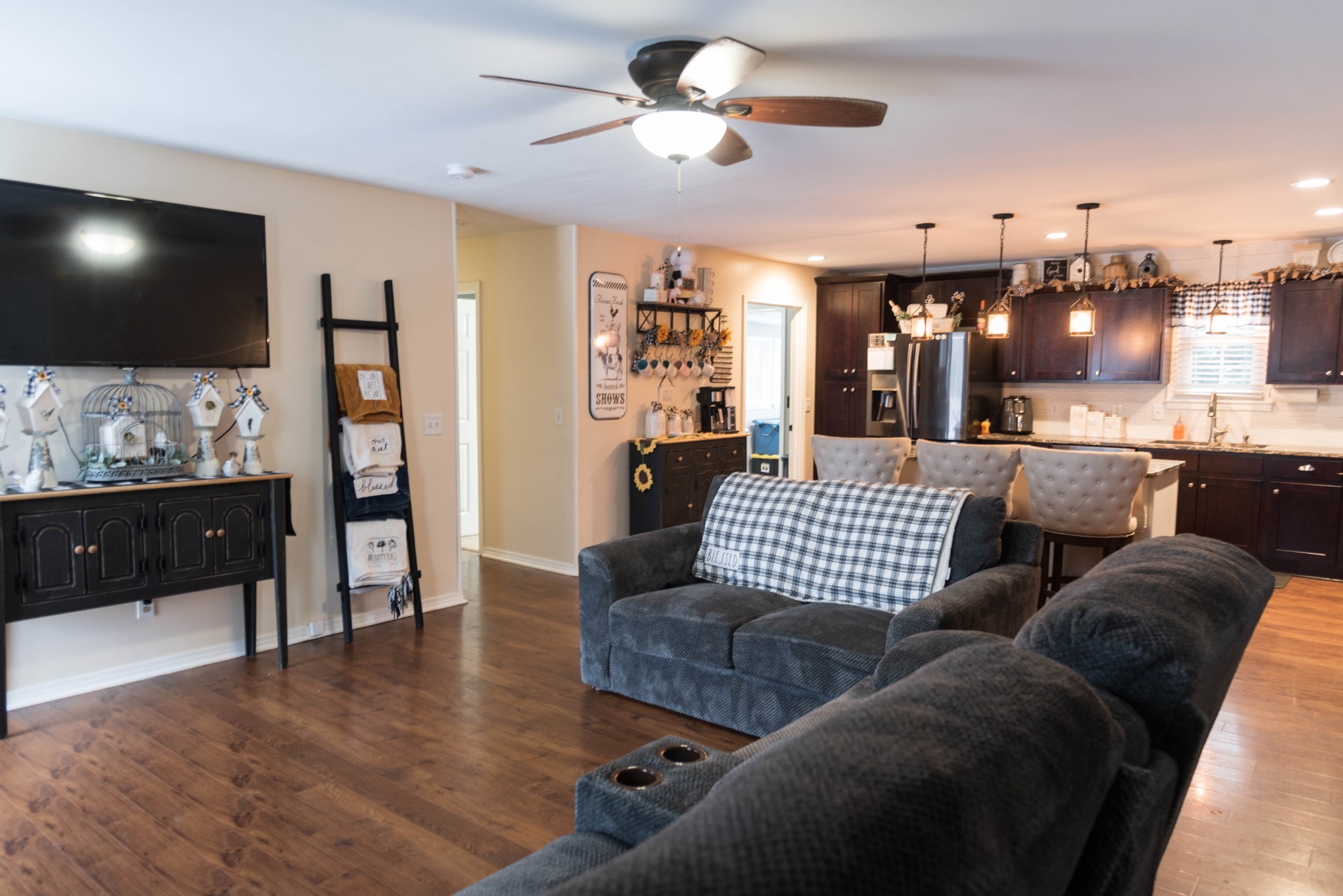105 Biggs Road Cottontown, TN 37048 - Photo 5 of 40 a living room with furniture and a flat screen tv