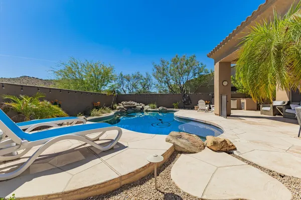 a view of outdoor space and swimming pool