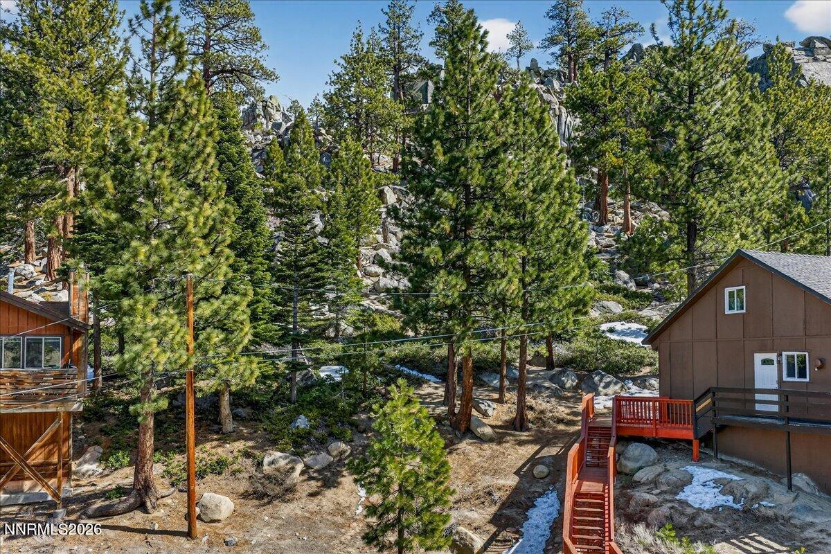 187 Tramway Drive Stateline, NV 89449 - Photo 8 of 10 a backyard of a house with lots of green space