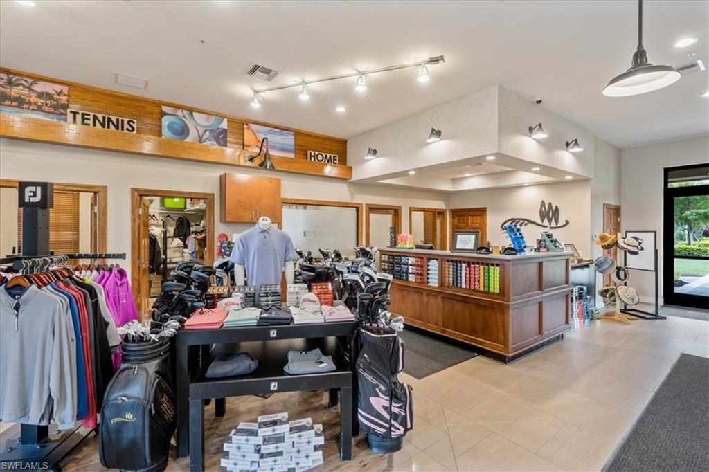 9509 Montelanico Loop Naples, FL 34119 - Photo 47 of 50 a view of a room with gym equipment