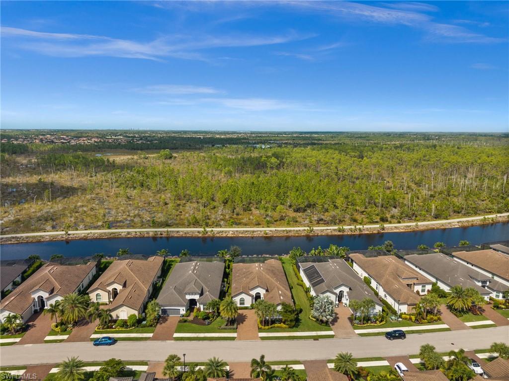 9509 Montelanico Loop Naples, FL 34119 - Photo 7 of 50 a view of lake view and mountain view
