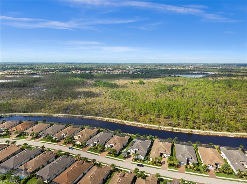 9509 Montelanico Loop Naples, FL 34119 - Photo 8 of 50 a view of swimming pool with ocean view