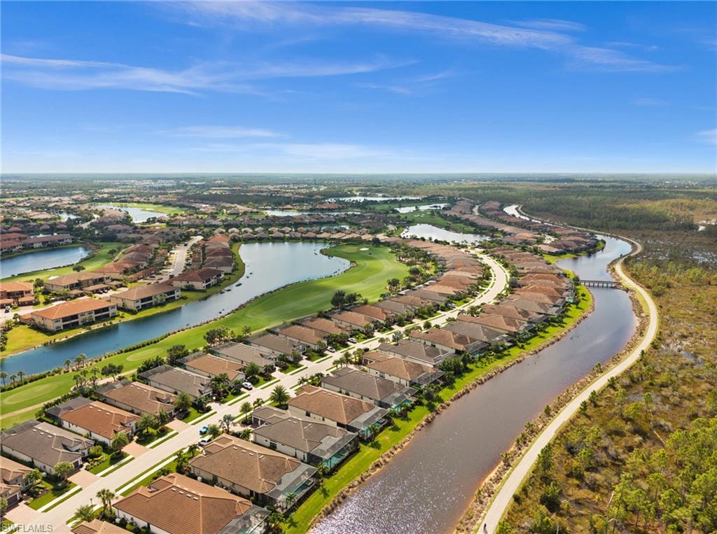 9509 Montelanico Loop Naples, FL 34119 - Photo 10 of 50 an aerial view of a city