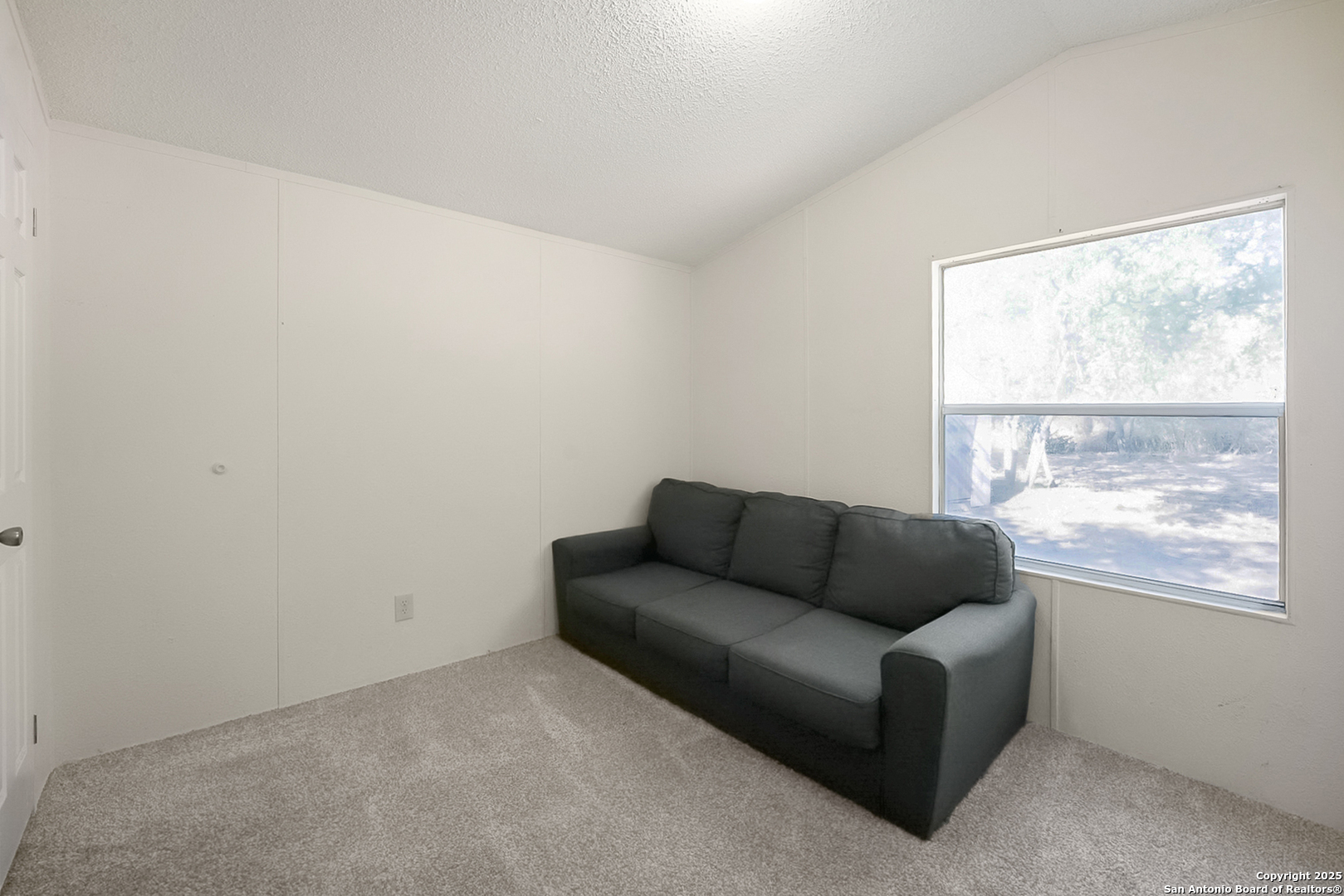25335 Pleasanton Road San Antonio, TX 78264 - Photo 26 of 26 a living room with furniture and a window